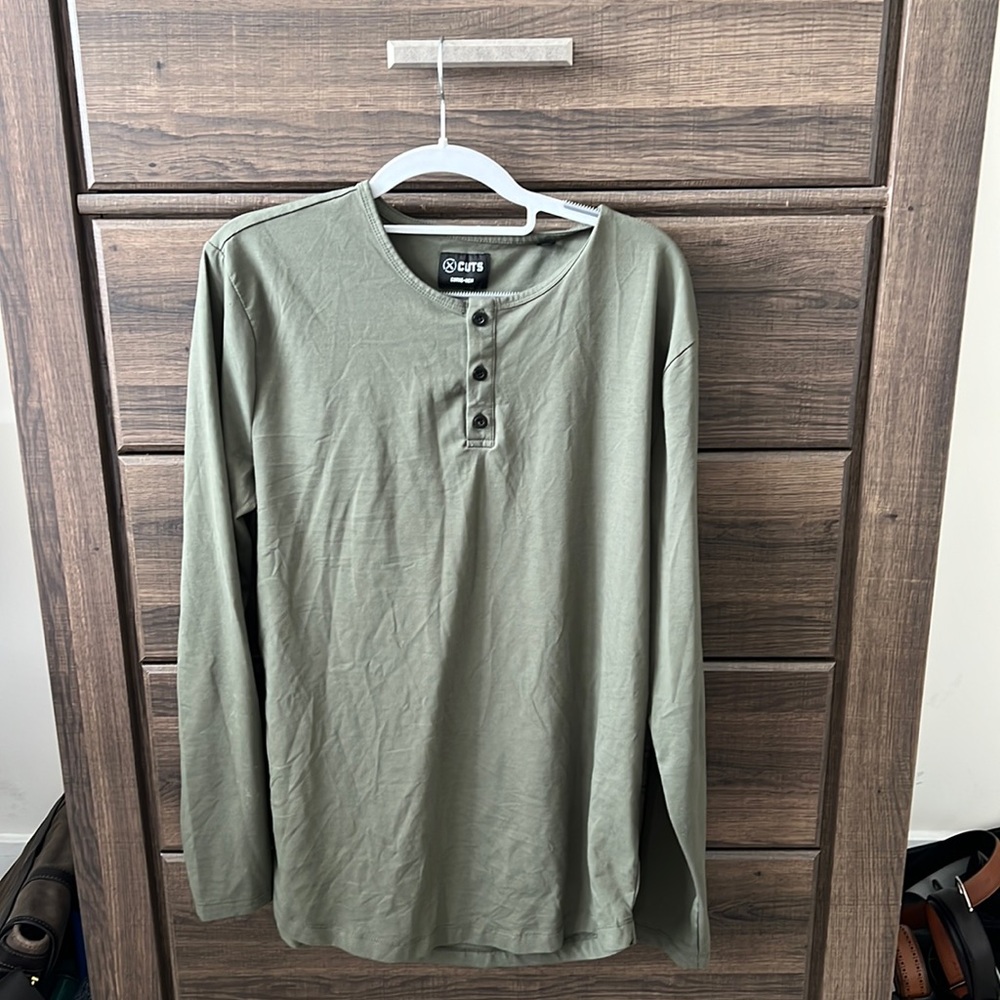 Cuts Curve Hem Long sleeve Henley.  Size Large